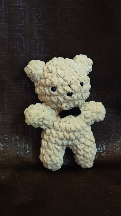 Muffin handmade crochet teddy bear plush made with ultra-soft premium blanket yarn and black bow tie.