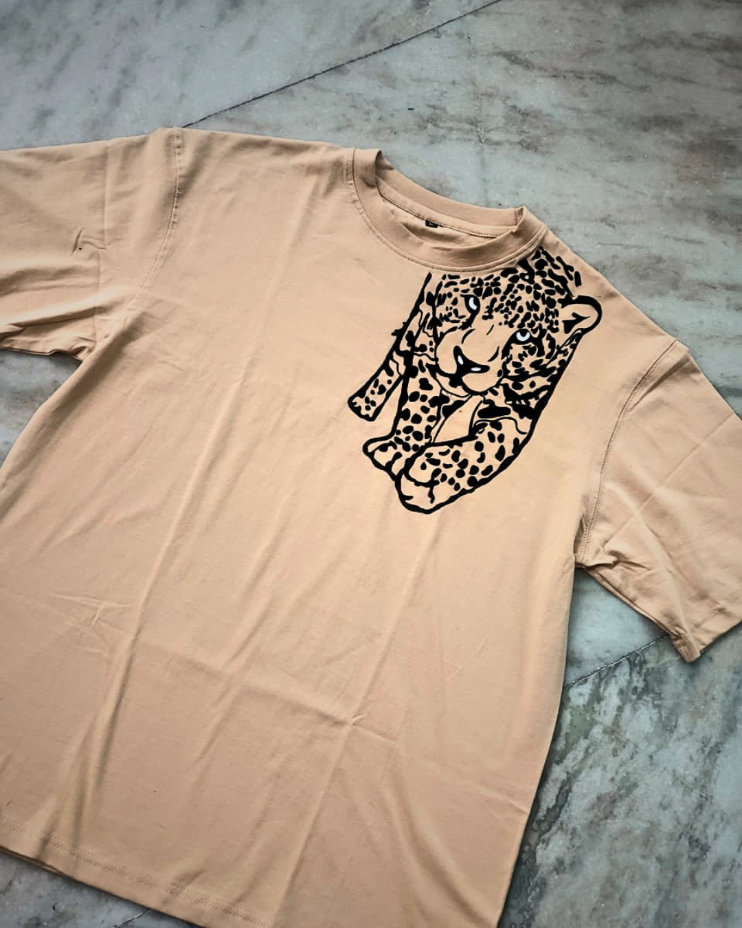 Hand-painted leopard beige cotton T-shirt with unique handmade wildlife artwork.