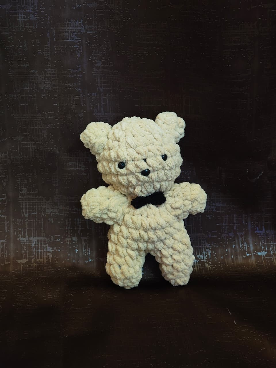 Muffin handmade crochet teddy bear plush made with ultra-soft premium blanket yarn and black bow tie.