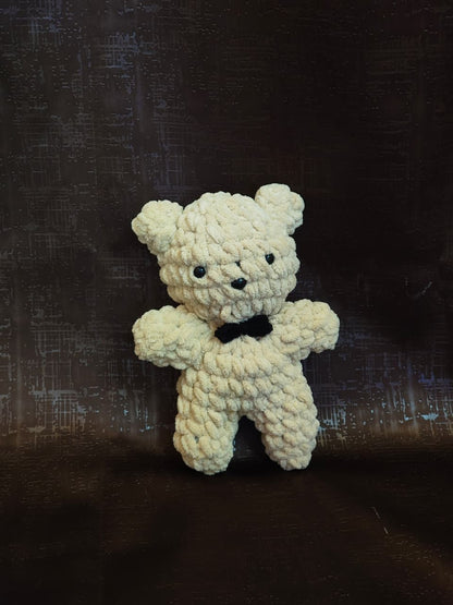 Muffin handmade crochet teddy bear plush made with ultra-soft premium blanket yarn and black bow tie.