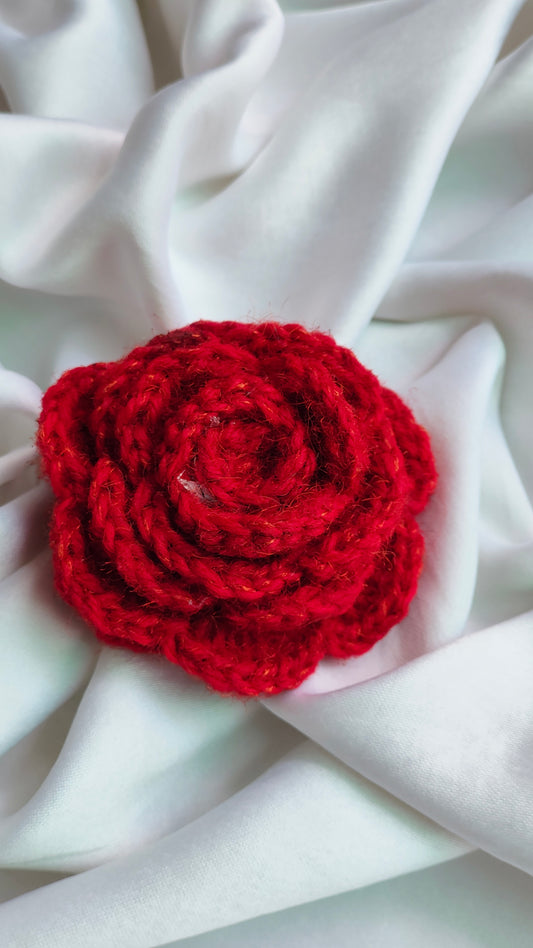 Red crocheted rose hair clip