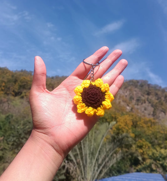 Handmade sunflower crochet keychain with floral crochet design, aesthetic handmade keychain accessory for bags, backpacks, purses, and car keys, cute boho crochet bag charm.