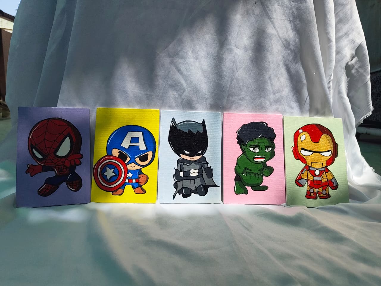 Colorful handmade superhero canvas paintings with Spider-Man, Captain America, Batman, Hulk, and Iron Man, perfect for superhero wall art and home decor.