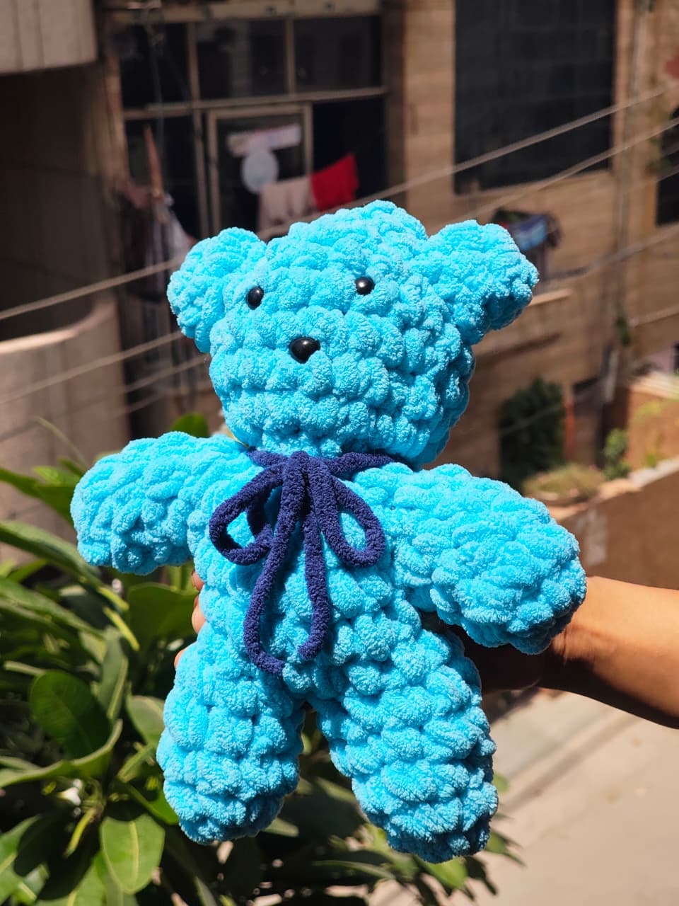 Cookie handmade crochet teddy bear plush featuring a soft chenille texture and adorable handcrafted design, perfect for gifting and nursery decor.