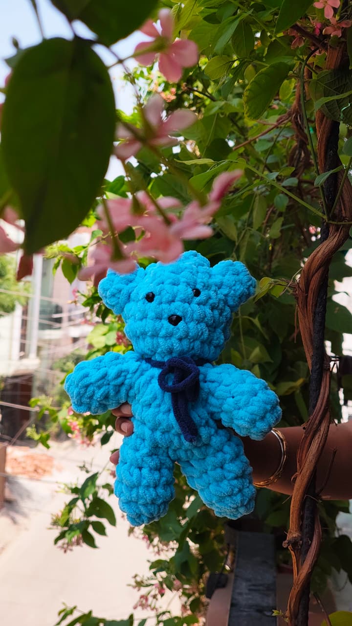 Handmade crochet teddy bear plush crafted with soft  yarn, cute amigurumi teddy bear for nursery décor, gifting, and plush collections.