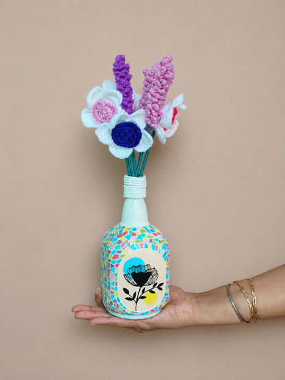 Hand-painted mosaic decorative bottle for home decor with colorful handmade artwork.